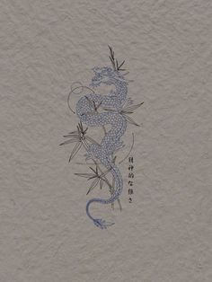 a drawing of a dragon on paper with chinese writing