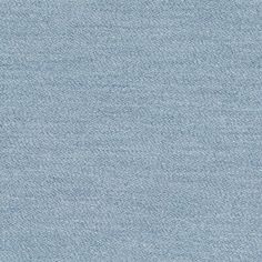 an upholstered light blue fabric texture background