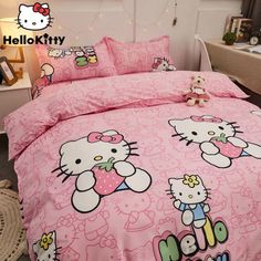 pink hello kitty bedding set with matching comforter and pillowcases in bedroom