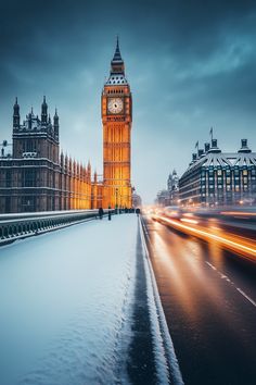 the big ben clock tower towering over the city of london covered in snow and ice