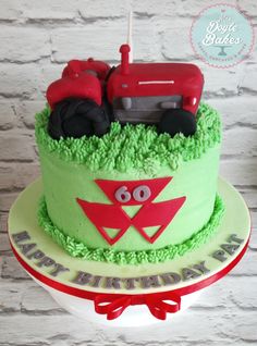 a birthday cake with a tractor on top