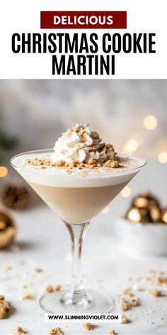 a christmas cookie martini is garnished with whipped cream