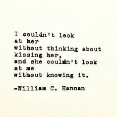 an old typewriter with the words i couldn't look at her without thinking about kissing her and she couldn't look at me without loving it