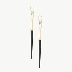 These slender drop earrings spike in bright white or dyed black bone and are finished with handmade brass caps and hooks. Handcrafted in brass by artisans in Kenya using traditional techniques. Handcrafted in brass and ethically sourced horn by artisans in Kenya. Your purchase promotes artisan innovation + entrepreneurship. Height: 3.7in (93.98mm) Thickness: 0.15in (4mm) Horn Earrings, Beaded Earrings Tutorials, Black Earrings Dangle, Spike Earrings, Earring Tutorial, Handmade Brass, Summer Earring, Ethical Jewelry, Beaded Hoops