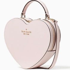 Kate Spade Heart Shack Chalk Pink Heart Shape Crossbody As Seen On Tik Tok Price Is Strictly Firm 7.48"H X 8.27"W X 2.36"D Handle Drop: 2.5" Strap Drop: 22" Saffiano Metal Pinmount Logo Two Way Spade Jacquard Lining Interior Front Slip Pocket Zip Around Closure Dust Bag Not Included New York Love, Kate Spade Heart, Heart Purse, Heart Shaped Bag, Kate Spade Crossbody Purse, Black Satchel, Pink Handbags, Heart Bag, Chain Crossbody Bag