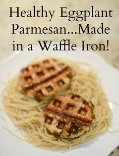 two waffles sitting on top of some noodles with the words healthy eggplant parmesan made in a waffle iron