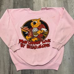 Vintage Beer Bear Man Cannot Live Off Bread Alone 80s Pink Distressed Sweatshirt Made in USA late 80s  Distressed condition due to stains and a small hole left of the collar  Size Medium Measurements  Pit to pit 21 Length 23.5 Vintage Distressed Crew Neck Sweatshirt, Vintage Long Sleeve Concert T-shirt, Vintage Long Sleeve T-shirt For Concerts, Retro Crew Neck Sweatshirt For Concerts, Vintage Crew Neck Tops For Concerts, Vintage Long Sleeve Tops For Concert, Beer Bear, Distressed Sweatshirt, Bear Man