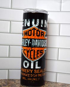 New to our line is our distressed finish look. Here we have a Harley Davidson oil can fully depicting this new look. Great for the mechanic or any cycle enthusiast. Harley Tumblers, The Mechanic, Vendor Events, Cold Temperature, Look Here, 20 Oz Tumbler, Way Down, Stainless Steel Tumblers, Harley Davidson