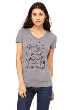 This is a size XL. Tri-blend gray tee shirt with short sleeves, classic crew neck and a feminine cut featuring my cat silhouettes print in black. -50% polyester -25% cotton -25%rayon -printed with water based ink -bella canvas apparel -Pre washed and Pre shrunk  I know sizing can be difficult so if you have any questions or need any help, please don't hesitate to ask. I'll be more than happy to help!  The tee shirt brand is Bella Canvas and their size XL normally fits sizes 10-14 ARTIST RETAINS Casual Fitted T-shirt With Cat Design, Relaxed Fit Short Sleeve T-shirt With Cat Design, Fitted Casual T-shirt With Cat Design, Fitted Cat Print Graphic Tee, Fitted Cat Print Graphic Tee T-shirt, Lady Cat, Gift For Cat Lover, Gray Cat, Cat Lover Shirt