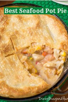 the best seafood pot pie recipe is made with chicken, corn, and carrots