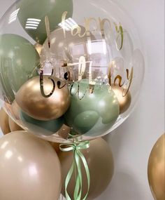 a bunch of balloons that say happy birthday in gold, silver and green colors with the words happy birthday written on them