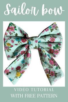 a bow with flowers on it and the words sailor bow written in white, blue, pink