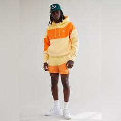 Curvy Colorblock Sweatshirt By Champion In The Brand’s Signature Reverse Weave Fabrication. Includes An Adjustable Hood, Kanga Pocket And Ribbed Knit Trims. Available Exclusively At Urban Outfitters. Content + Care - 80% Cotton, 20% Polyester - Machine Wash - Imported Size + Fit - Measurements Taken From Size Medium - Chest: 21" - Length: 27" Sporty Spring Hoodie With Color Block, Sporty Color Block Hoodie For Spring, Sporty Spring Color Block Hoodie, Yellow Color Block Sweatshirt For Fall, Yellow Cotton Color Block Sweatshirt, Yellow Color Block Cotton Sweatshirt, Yellow Color Block Hoodie For Winter, Yellow Sporty Hoodie For Spring, Sporty Yellow Hoodie For Spring