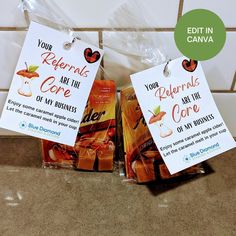 two bags of food sitting on top of a counter