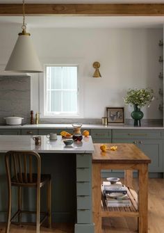 the kitchen is clean and ready to be used as a dining room or breakfast nook