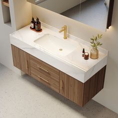 a bathroom sink with two bottles on the counter