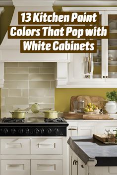 a kitchen with white cabinets and an island in front of the stove top is surrounded by pots and pans