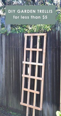 a wooden ladder leaning against a fence with the words diy garden trelliss for less than $ 5