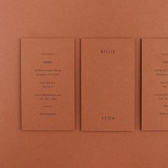 three brown business cards with the words, billie and vegas written on them in black ink