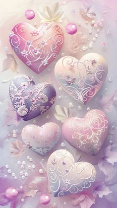 some hearts are floating in the air with bubbles and flowers around them on a purple background