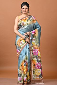 Embrace sophistication with our Grey Color Hand Painted Pure Silk Saree, a stunning blend of traditional craftsmanship and contemporary elegance. Designed for women who appreciate the beauty of Indian sarees, this exquisite piece is perfect for festive occasions like Durga Puja and Diwali, especially for those residing in Canada and the USA. Key Features: Premium Pure Silk: Woven from the finest silk, this saree offers a luxurious feel with a smooth, flowing drape. The high-quality silk ensures Saree Photography, Unique Saree, Dhakai Jamdani Saree, Hand Painted Sarees, Diy Mugs, Pure Silk Saree, Buy Sarees Online, Art Silk Sarees, Tussar Silk Saree