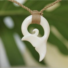 Beautifully handcrafted Buffalo bone handcrafted pendant on woven adjustable jute neck cord. Polished and detailed to bring out the best in each design. Set includes one of each Fish hook, Whale Tail and Petroglyph Honu! Individually boxed to give as gifts. Great quality and style at an affordable low price! Our buffalo bone pendants are great in and out of the water so you never have to take them off. Braided cording is adjustable so it fits from keiki to adults. Great for men and women, boys a Traditional Jewelry With Sliding Knot For The Beach, White Waxed Cord Beach Jewelry, White Waxed Cord Jewelry For Beach, White Waxed Cord Jewelry For The Beach, Adjustable Fair Trade Jewelry For Gifts, Artisan Jewelry With Adjustable Cord In Natural Color, Traditional Jewelry Gift With Adjustable Length, Handmade White Jewelry With Waxed Cord, White Bohemian Jewelry With Waxed Cord