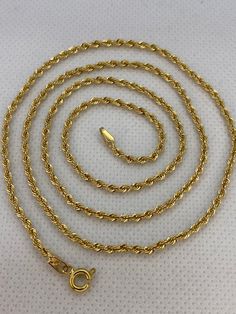 18kGold 19.5 inches 2.940gr 2mm18kGold 22 inches 3.69gr 2mm18kGold 23 inches 3.69gr 2mmThis is a Trending Etsy Bestselling ROPE Necklace. It is made with Authentic Genuine Solid 18K Gold.Easy to layer! Looks beautiful with your favorite charms or even if you wear it alone.BEST PRICE ON ETSY FOR SOLID 18kGOLD NECKLACES!Premium spring Ring FREE SHIPPING within the USA and Canada.International shipping is available at the most economical rates on ETSY.I HAVE BEEN IN THE JEWELRY BUSINESS ALL MY LIFE 14k Gold Rope Chain Necklace As Gift, Gold Rope Necklace, Rope Chain Gold, 18k Gold Chain, Gold Rope Chains, Rope Chain Necklace, Grad Gifts, Rope Necklace, Chain Gold