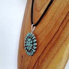 "This stunning Squash Blossom pendant was handcrafted in Mexico. Each teardrop bezel is inlaid with turquoise coloured enamel enhanced with tiny brown flecks. Surrounding the centre blossom is a woven wire accent. Complete with an 18\" inch black cord ready to wear! The pendant is approximately 2\" inches long. This piece is silver plated. The pattern of the enamel may vary very slightly, they are all individually hand crafted. If you've got any questions don't hesitate to ask me. This pendant c Silver Knot Bracelet, Turquoise Squash Blossom, Navajo Style, Mexican Jewelry, Squash Blossom Necklace, Squash Blossom, Knot Bracelet, Stacked Bangles, Silver Plated Jewelry