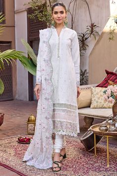 Blue Long Kameez Pajama with Dupatta Pakistani Eid Dress is an embroidered masterpiece that will give you a traditional and glamorous look on the festive occasion. Lavish designs, floral motifs, and hand-worked embellishments enhance the charm of this Pakistani Party Dress that give you eye-catching look. Detailed Description: SKU: PB0072 Detailing: Embroidery, Threads, Floral designs, Motifs, Sequins, Beads Color: Creamy White Fabric: Raw Silk Design: Fully Embroidered dress Event: Festive, Par Long Kameez, Desi Fits, Eid Dress, Dress Event, Silk Design, Eid Dresses, Embroidery Threads, Poetry Images, Eid Collection