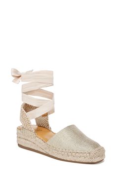 A graceful tie wrap completes this espadrille-inspired sandal balanced on a low wedge for walkable comfort. 1 3/4" heel; 3/4" platform Textile upper/synthetic lining and sole Imported Summer Gold Espadrilles With Removable Insole, Gold Adjustable Wedge Heel Sandals, Gold Espadrilles With Woven Sole For Spring, Adjustable Closed Toe Platform Espadrilles, Gold Espadrilles With Woven Sole, Adjustable Platform Espadrilles With Closed Toe, Adjustable Platform Closed Toe Espadrilles, Gold Espadrilles For Summer, Gold Closed Toe Espadrilles For Summer