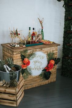 a bar with pineapples and flowers on it