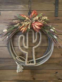 a cactus wreath hanging on the wall