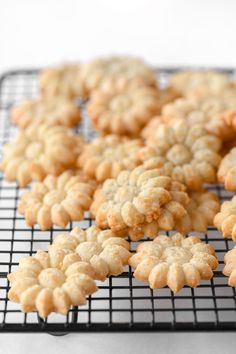 some cookies are cooling on a wire rack