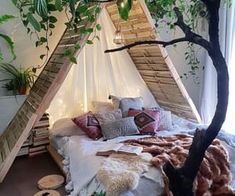 a bed made out of wood and some plants