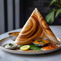 a white plate topped with food on top of a table