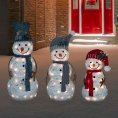 Set of 3 snowman family outdoor Christmas decoration. Pre lit with 90 warm white incandescent lights. Can be displayed separately or grouped together Outdoor Snowman, Lighted Snowman, Warm White Lights, Snowman Family, Christmas Yard Decorations, Christmas Outdoor, Family Decor, Christmas Central, Christmas Yard