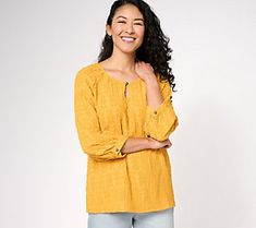 A delightful addition to your wardrobe, this textured peasant top exudes timeless Bohemian elegance. Style it with boyfriend jeans and strappy sandals or a laid-back, carefree look. From Canyon RetreatTM. Textured Cotton Tops For Spring, Daywear Long Sleeve Tops With Crinkle Texture, Long Sleeve Tops With Crinkle Texture For Daywear, Textured Tops For Fall, Spring Cotton Crinkle Texture Top, Spring Cotton Top With Crinkle Texture, Fall Cotton Blouse With Crinkle Texture, Spring Blouse With Crinkle Texture For Daywear, Casual Textured Blouse For Fall