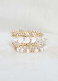 "❖Simply Becca Stack❖ * A collaboration with Becca, from Simply Becca!  ‣ This listing offers the option of purchasing the stack of 7, or individual bracelets. ‣ Buy more, save more - applied at checkout      * 3 10% off      * 5, 15% off      * 7, 20% off ‣ Simply Becca Stack features 7 bracelets: * 1 | Jules * Snow * 2 | Britt * Crystal * 3 | Lyla * Snow * 4 | Layna 8mm * Snow * 5 | Aria * Natural White Mother of Pearl * 6 | Myla * 5mm * 7 | Bella * Snow Julisa Bracelets Feature:  ‣ Tight/Sturdy elastic, pre-stretched to prevent bracelet from stretching out ‣ Sizing according to wrist size ‣Sizing Tips:  Please measure your wrist for the best fit!  *Using a soft tape measure/string, measure around your wrist, above the wrist bone *Add length according to your desired fit:       * 0\" - f Simply Becca, Bracelet For Her, Layered Bracelets, Tape Measure, Bracelet Stack, Hand Beading, Jewelry Bags, Stretch Bracelet, Bracelet Sizes