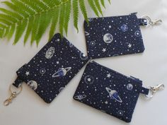 "Astronomy Space Planets Keychain Simple Zipper Coin Purse  Navy fabric with silver, blue and white planets and stars Holds Coins, Cash, Airpods, Sanitizer, Mask, Medication, etc.  Create your own emergency kit! The purse has a 1\" silvertone keyring and lobster clasp    Color-Coordinating solid color navy lining Finished Size:  3-1/2\" X 5\" (Approximate) Zips tightly closed with a navy nylon zipper.  Optional: Add a Plastic Coil Wrist Strap for only $ 1.50 more!  Message me your color choice(s Planets And Stars, Zipper Coin Purse, Loyalty Cards, Space Planets, Dream School, Navy Fabric, Air Pods, Loyalty Card, Emergency Kit