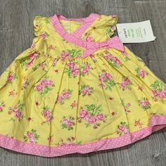 This Is A Cute Dress That Is New With Tags Playful Yellow Short Sleeve Dress, Fitted Yellow Dress For Playtime, Fitted Yellow Playful Dress, Playful Yellow Dress For Playwear, Cute Yellow Spring Dress, Girls Pink Dress, Floral Baby, Cute Dress