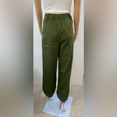 Spandex/Green For Women Green Pull-on Straight Pants, Green Casual Pull-on Bottoms, Green Pull-on Ankle-length Pants, High Waist Stretch Solid Cargo Pants, Stretch High Waist Cargo Pants, Green Pull-on Trousers, Spring Stretch Harem Pants With Pull-on Style, Green Pull-on Style Pants For Spring, Khaki Stretch Full Length Pants