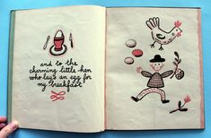 an open children's book with drawings on the pages and words written in it