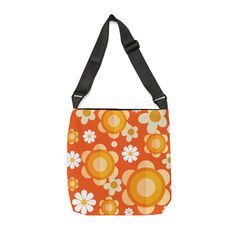 Flower Power Groovy Orange, Mod Daisy, Yellow Flowers Hip Retro Adjustable Tote Bag Add functional perks to an already great fun and funky design and you get a staple for everyday use. With its zippered closure for added safety, and the adjustable straps for extra comfort, this tote bag has it all. .: 100% Spun Polyester.: Available in two sizes: 16''x16'' and 18x18''.: Adjustable strap.: Black interior lining and inner pocket.: Assembled in the USA from globally sourced parts 16" × 16'' 18" × 1 Daisy Yellow, Yellow Daisies, Funky Design, Black Interior, Yellow Flowers, Flower Power, Adjustable Straps, Daisy, Tote Bag