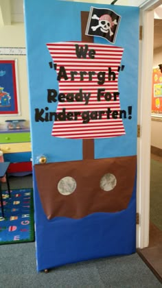 a door decorated to look like a pirate ship with the words we're alright ready for kindergarten