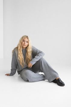 Indulge in comfort with these gray loungewear wide-leg pants, crafted from soft, luxurious Italian merino wool. With their cozy feel and versatile gray hue, they are perfect for lounging at home or stepping out in style. These pants effortlessly combine elegance and ease, making them a must-have staple for your wardrobe. EVERY KNITTED ITEM HAS A STORY, PEOPLE, AND TRADITIONS BEHIND IT - Our creations come to life in a Lithuanian artisan workshop, within small family-run businesses. The artisans Luxury Relaxed Fit Wide Leg Loungewear Pants, Luxury Wide Leg Wool Pants, Luxury Gray Pants For Loungewear, Luxury Wide Leg Pants For Loungewear, Luxury Soft Knit Sweater For Loungewear, Luxury Fitted Sweater For Loungewear, Luxury Gray Wide Leg Pants, Luxury Gray Women's Pants, Luxury Gray High-waisted Pants