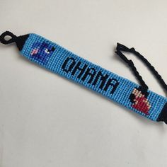 a blue lanyard with the word china on it and an image of a cartoon character