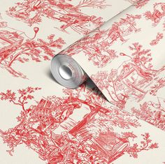 a roll of red and white wallpaper with trees, houses and buildings on it