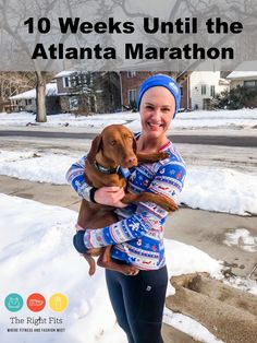 a woman holding a dog in her arms with the words, 10 weeks until the atlanta marathon