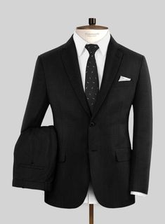 The black suit is often associated with formal wear, symbolizing refined style, and in this regard, our Lanificio Zegna Deep Black Wool Suit perfectly embodies the essence of a black suit. Made from pure wool fibers, it boasts a deep black hue with a solid texture that exudes confidence and elegance. Whether you're attending a wedding, a gala, or a black-tie event, this suit is sure to make a statement.  Look Includes    Lanificio     Zegna     Deep     Black     Wool  Fabric  Two Button Jacket Sharkskin Suit, Grey Wool Suit, Flannel Suit, Tailored Suit, Herringbone Tweed, Grey Tweed, Silk Suit, Tweed Suits, Linen Suit