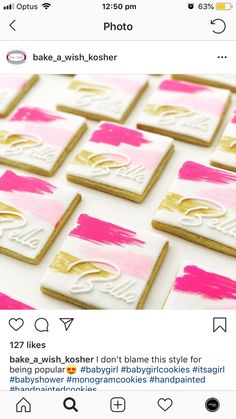 some pink and gold decorated cookies on top of a white table with the words bake - a - wish - kosher